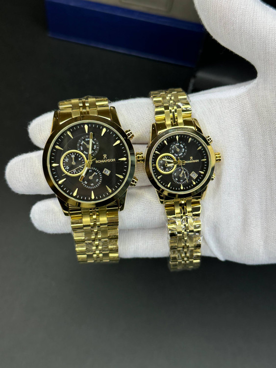 ساعت طرح کرنو ست مردانه و زنانه رومانسون طلایی صفحه مشکی