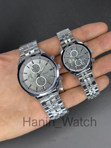 ساعت طرح کرنو ست مردانه و زنانه رومانسون استیل طوسی